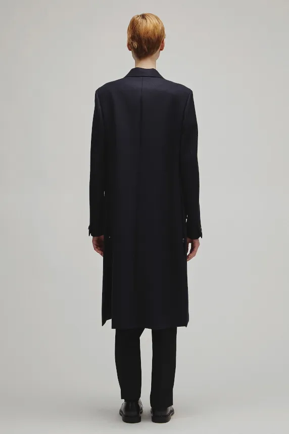 THE DOUBLE PEAKED TAILORED COAT